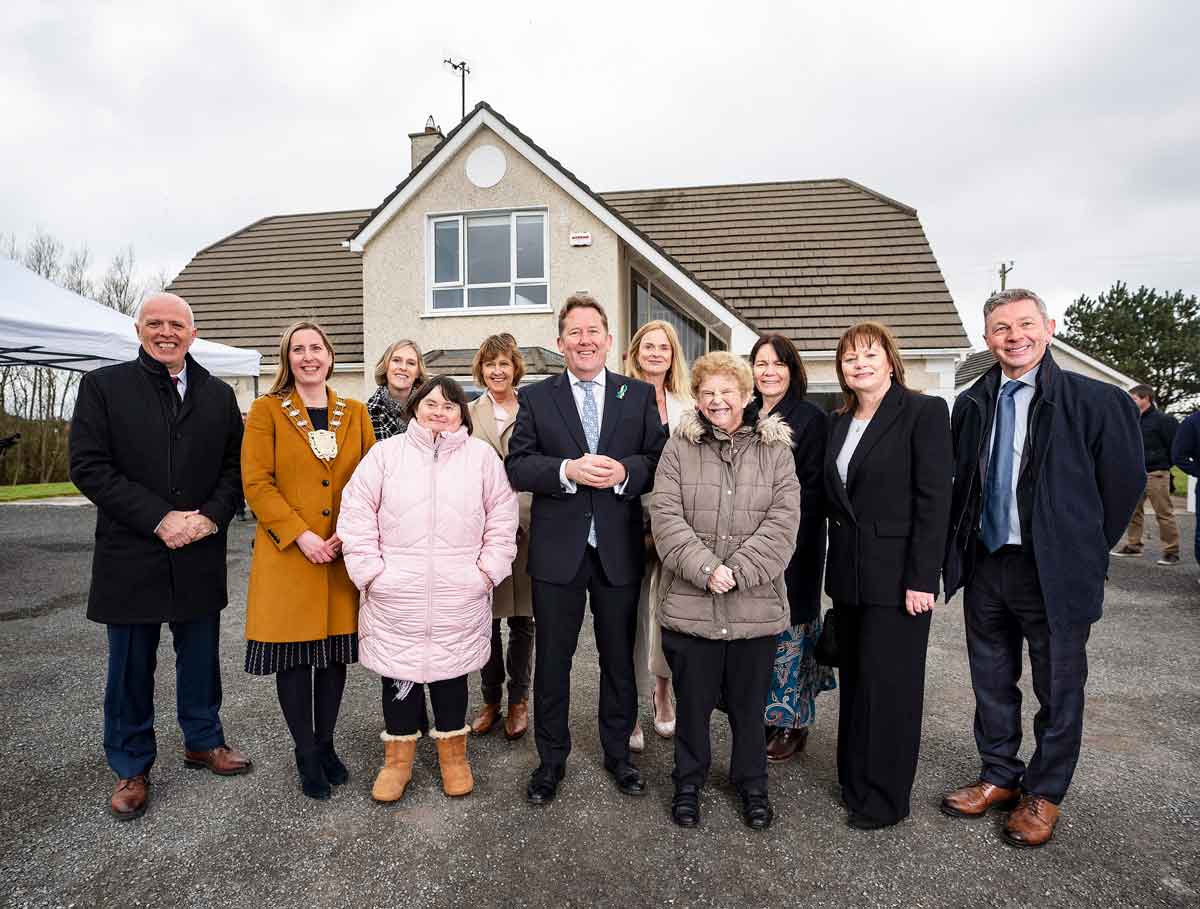 People supported by Prosper Fingal, staff and community guests gathered at a local facility opening